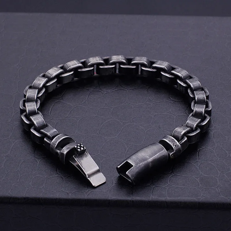 Black titanium steel punk chain bracelet with geometric design, 22cm length, on male wrist