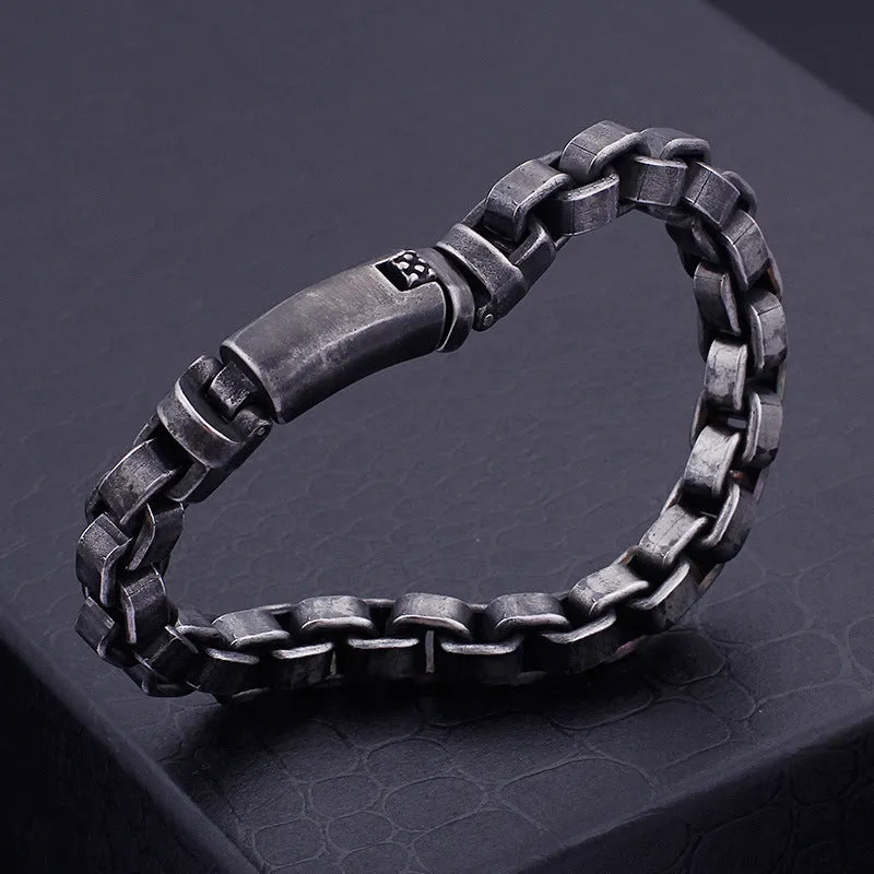 Black titanium steel punk chain bracelet with geometric design, 22cm length, on male wrist