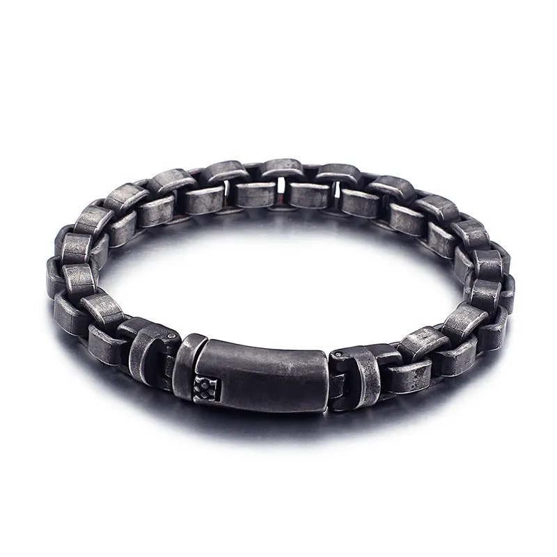 Black titanium steel punk chain bracelet with geometric design, 22cm length, on male wrist