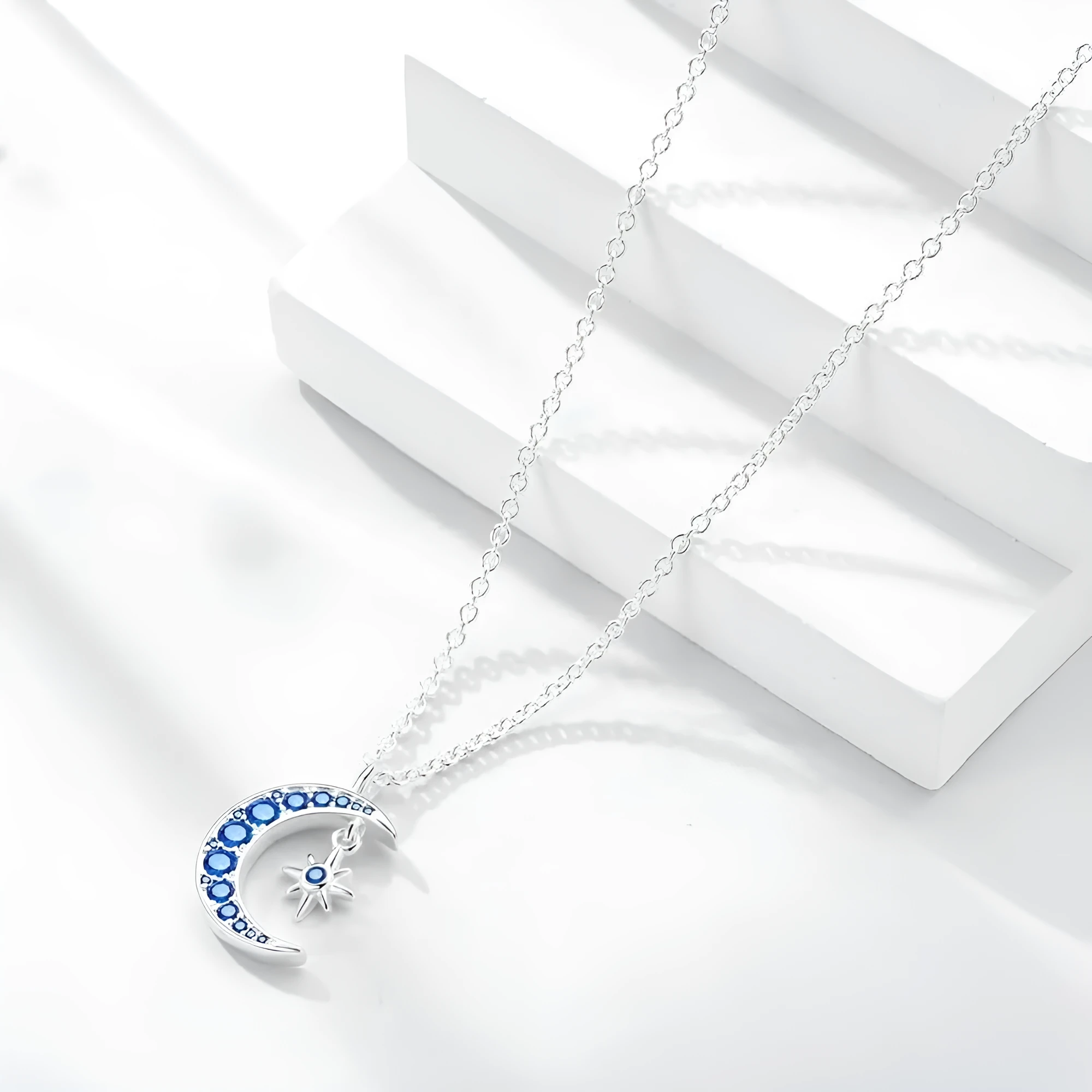 Copper blue moon necklace with electroplated white gold colour on adjustable O-ring chain