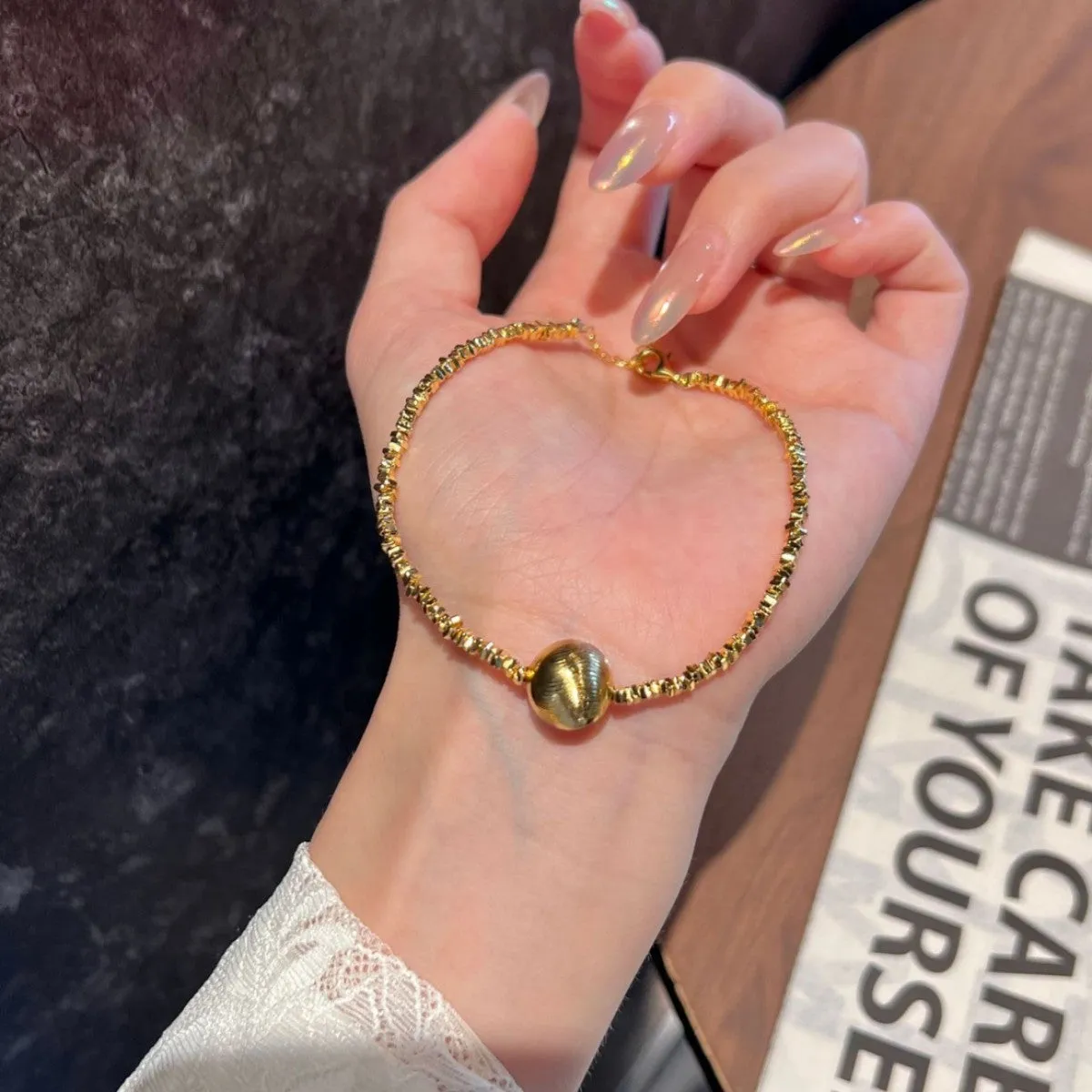 Unisex retro gradient cateye necklace and bracelet set in gold finish with broken silver cat eye accents