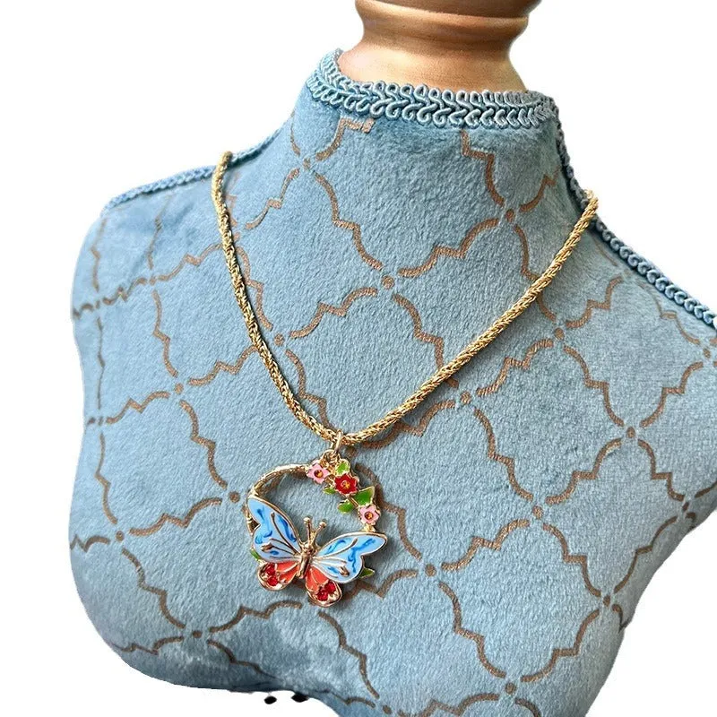 Vintage metal butterfly and petal stud earrings and pendant necklace set for women