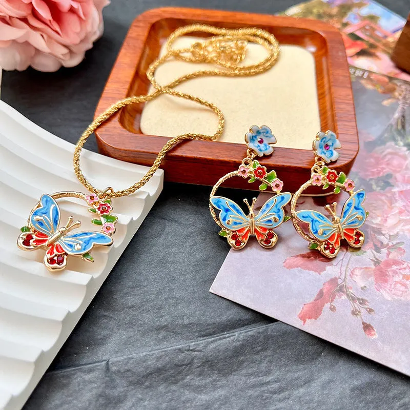 Vintage metal butterfly and petal stud earrings and pendant necklace set for women