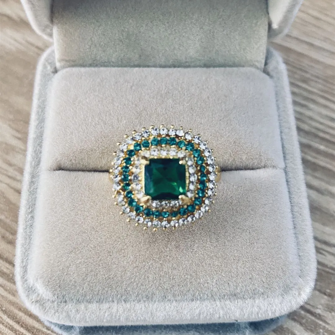 Emerald silver geometric metal ring ornament for women, shown on finger, size options available