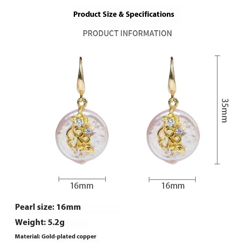 Women's matching baroque pearl geometry necklace with O-ring chain and earring set on display
