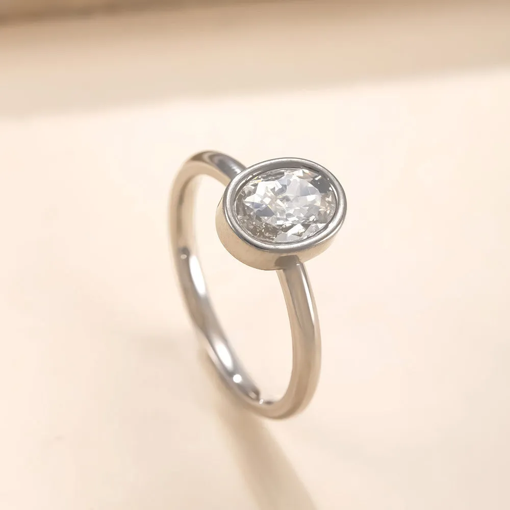 Stainless steel oval zircon ring with electroplated finish, available in steel, gold, or white gold, sizes No 6 to No 10