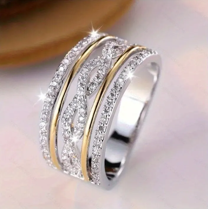 Platinum alloy wide face ring with hollow jeweled detailing, diamond treatment finish, women's ring