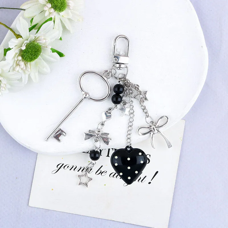 Retro zinc alloy key ring with bow and love heart chain design in multiple colour options