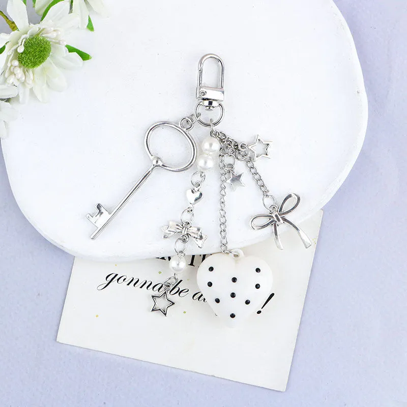 Retro zinc alloy key ring with bow and love heart chain design in multiple colour options