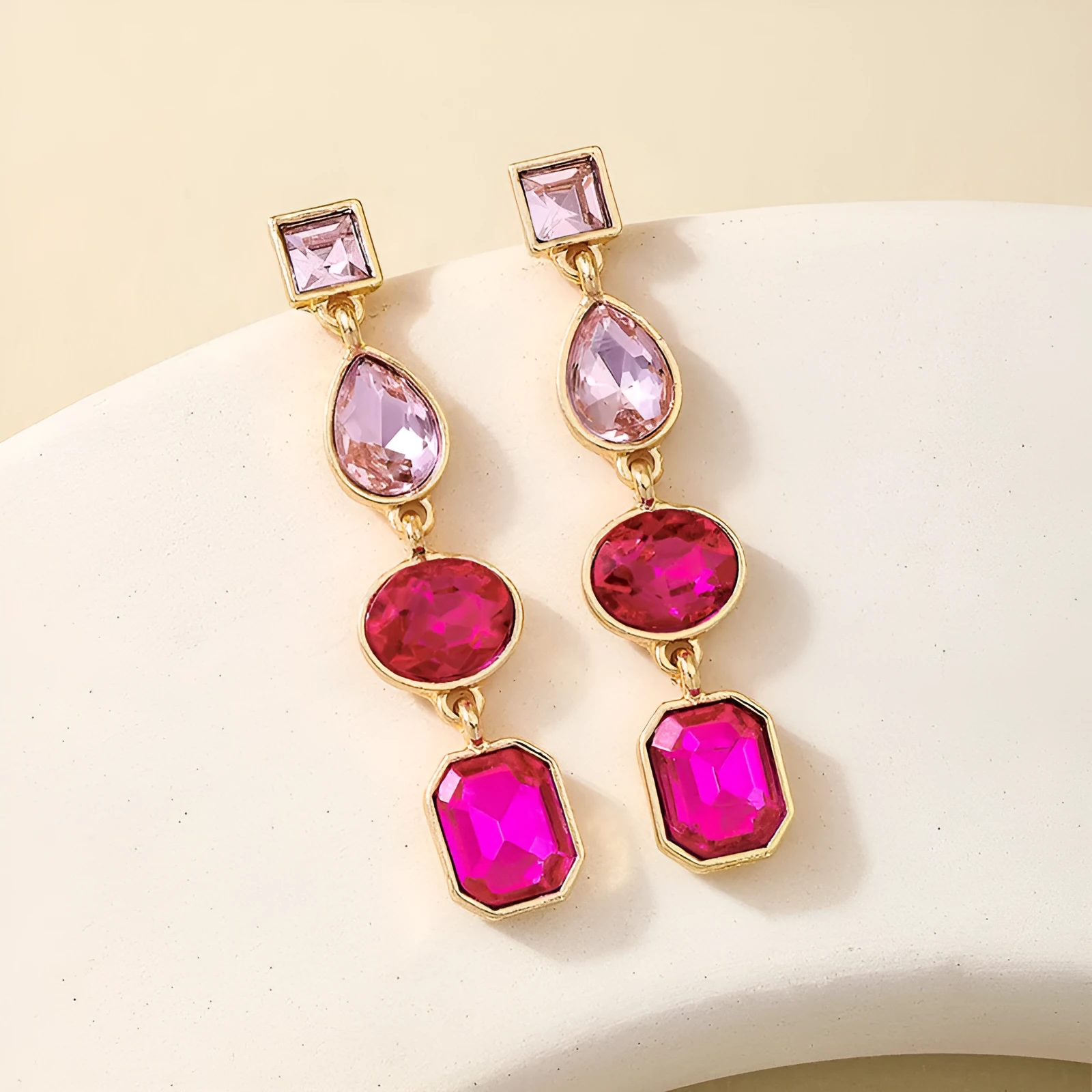 Women's geometric water drop rhinestone ear studs in royal blue alloy with silver tone setting