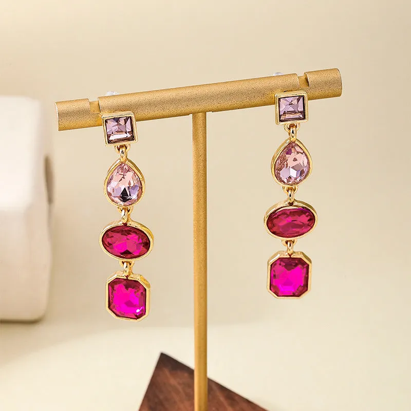 Women's geometric water drop rhinestone ear studs in royal blue alloy with silver tone setting