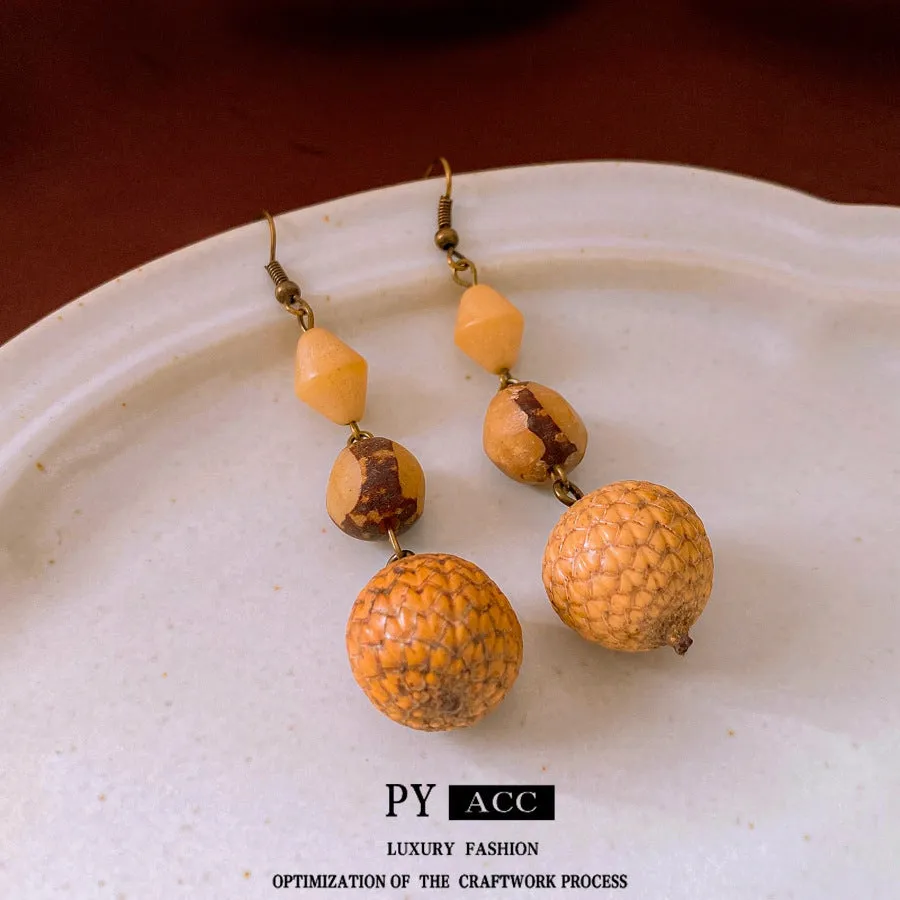 Resin fruit core tassel earrings in brown geometric round shape ethnic style for women