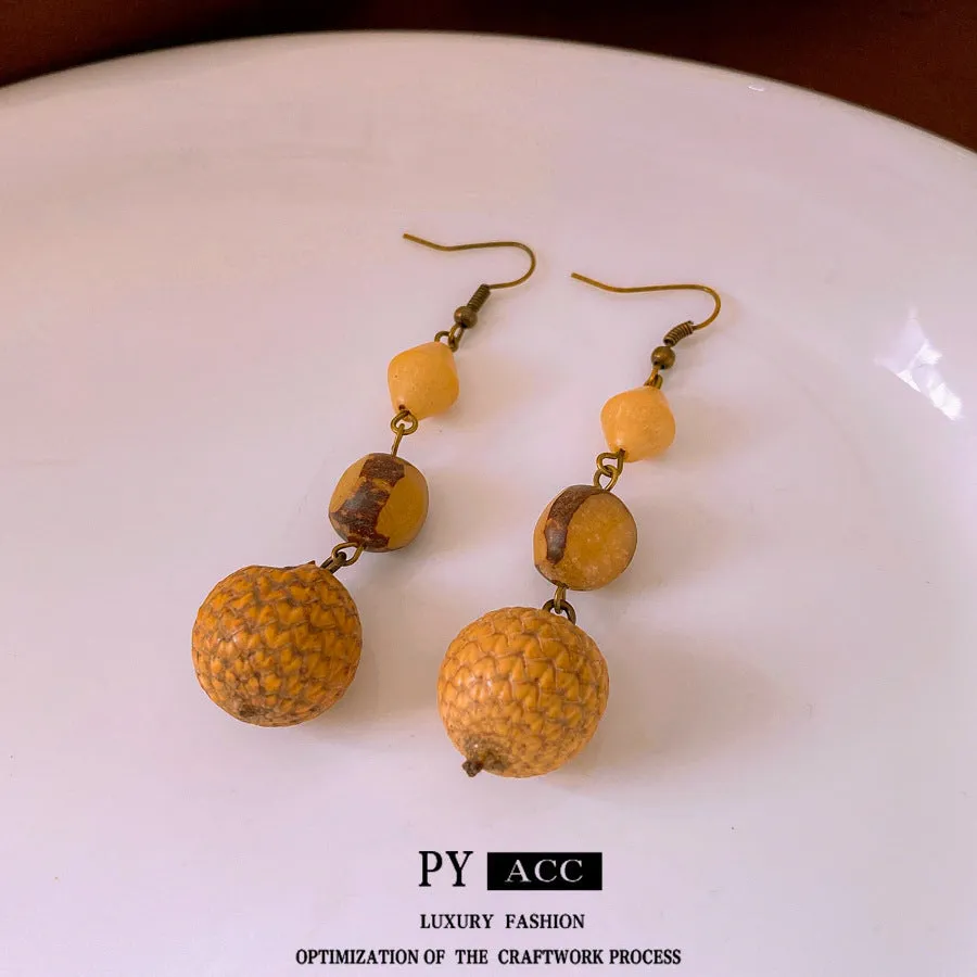 Resin fruit core tassel earrings in brown geometric round shape ethnic style for women