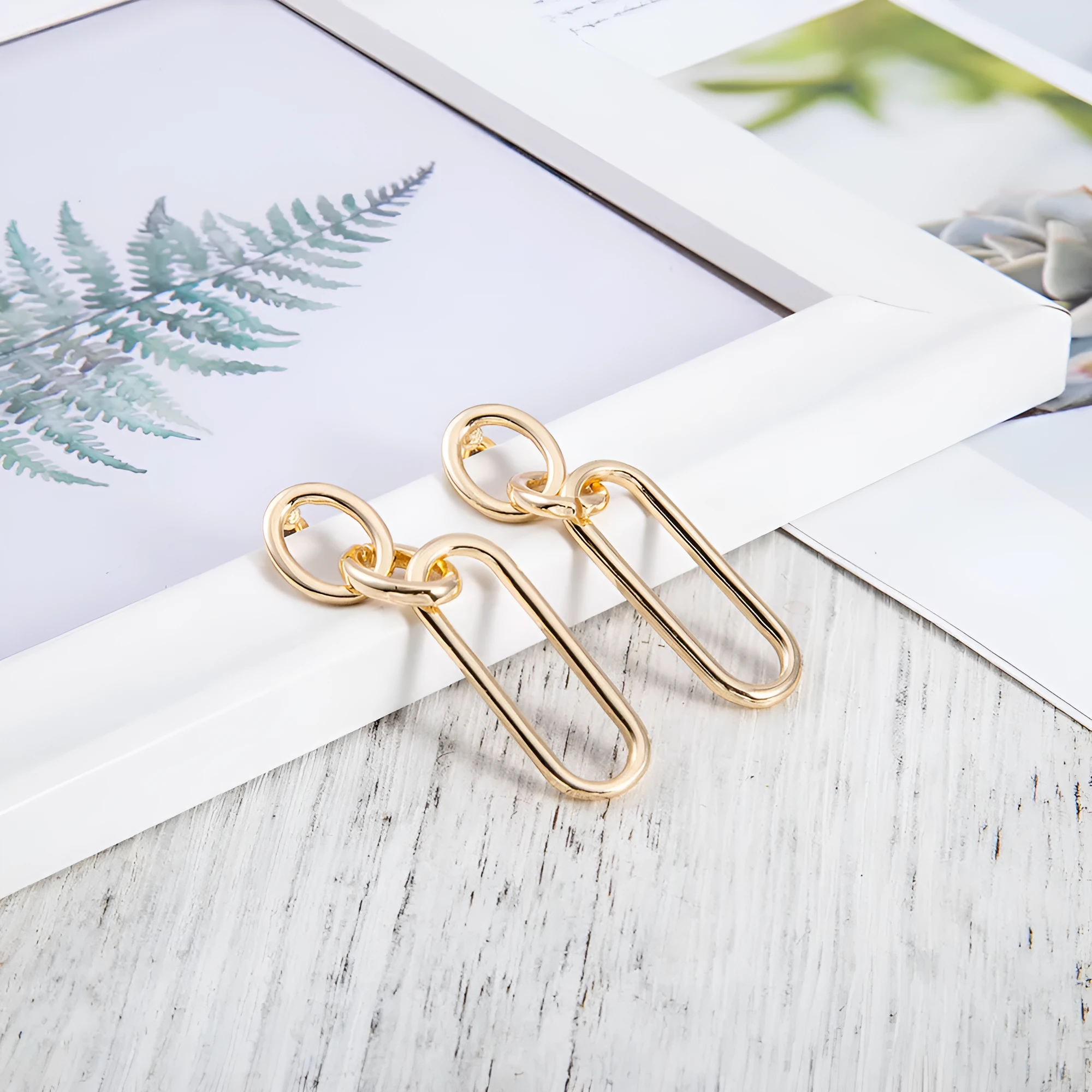 Geometric sterling silver needle colour hoop earrings with ring and line design on alloy base
