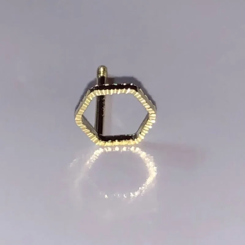 Small spiral geometric ear studs in gold hollow thread design with mixed material build and electroplated finish