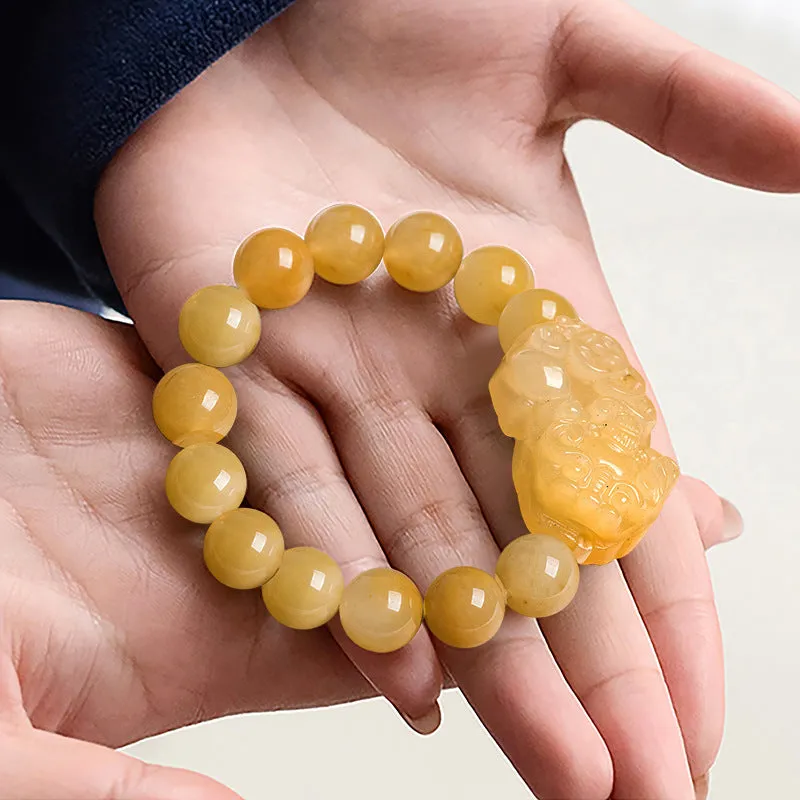 Carved Golden Thread Jade money bracelet showing Chinese coin charm and jade beads in two size options