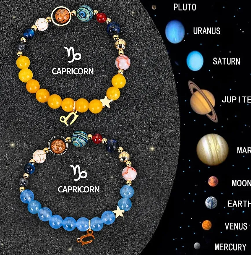 Set of two natural stone beaded bracelets with zodiac charms on an adjustable cord.