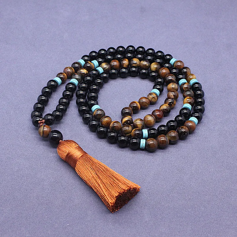 Black agate and tiger's eye geometric beaded bracelet and necklace set.