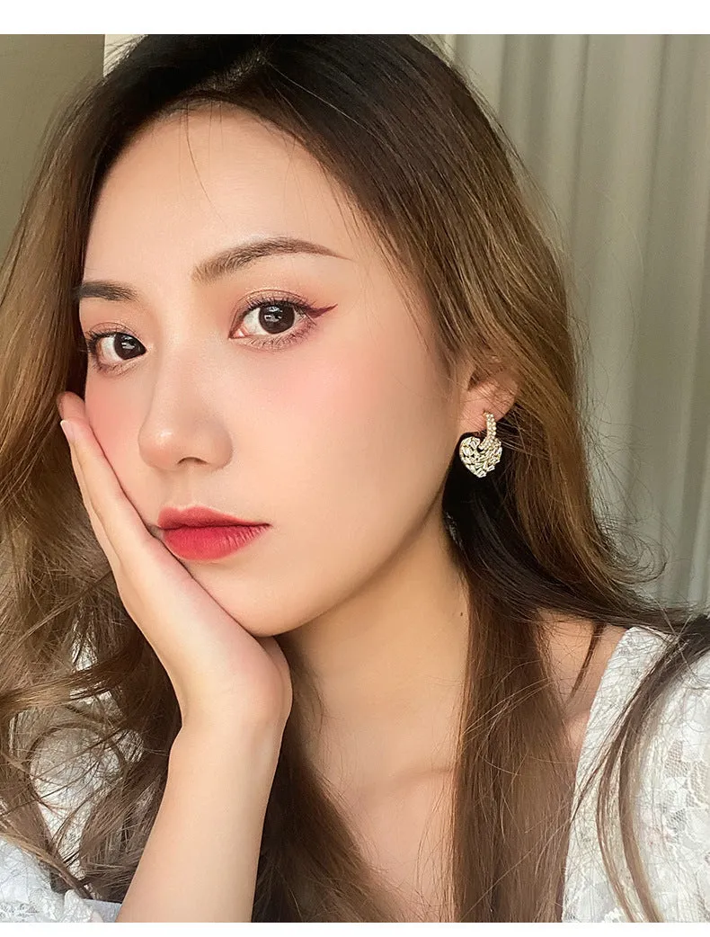 Heart shaped copper earrings with yellow finish and zircon stone for women