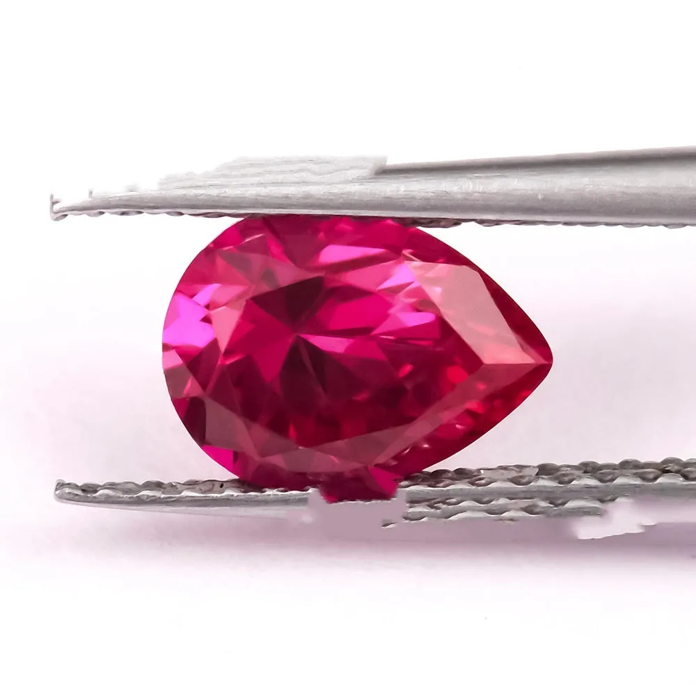 Artificial cultivated ruby gemstone showing red colour in various carat weights and shape options