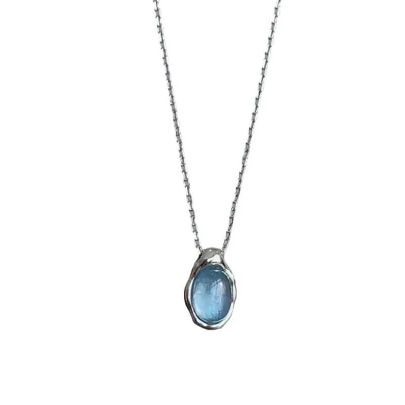 Navy blue water drop pendant copper necklace on woman with adjustable cross chain 41-50cm
