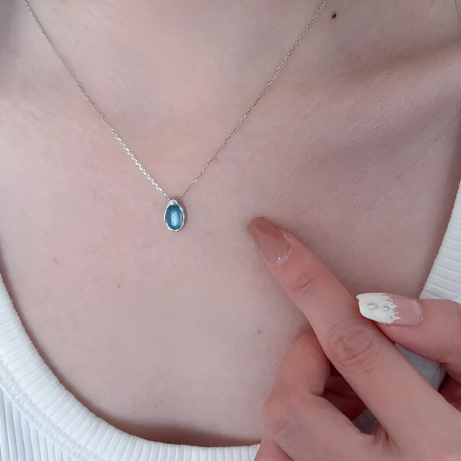 Navy blue water drop pendant copper necklace on woman with adjustable cross chain 41-50cm