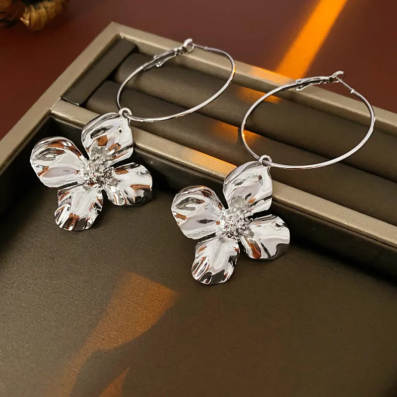 Silver needle metal flower earrings with gold electroplated finish, vintage style for women