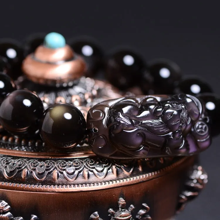 Polished crystal Pi Xiu bracelet with double-eye ice stone colouration in ethnic geometric style