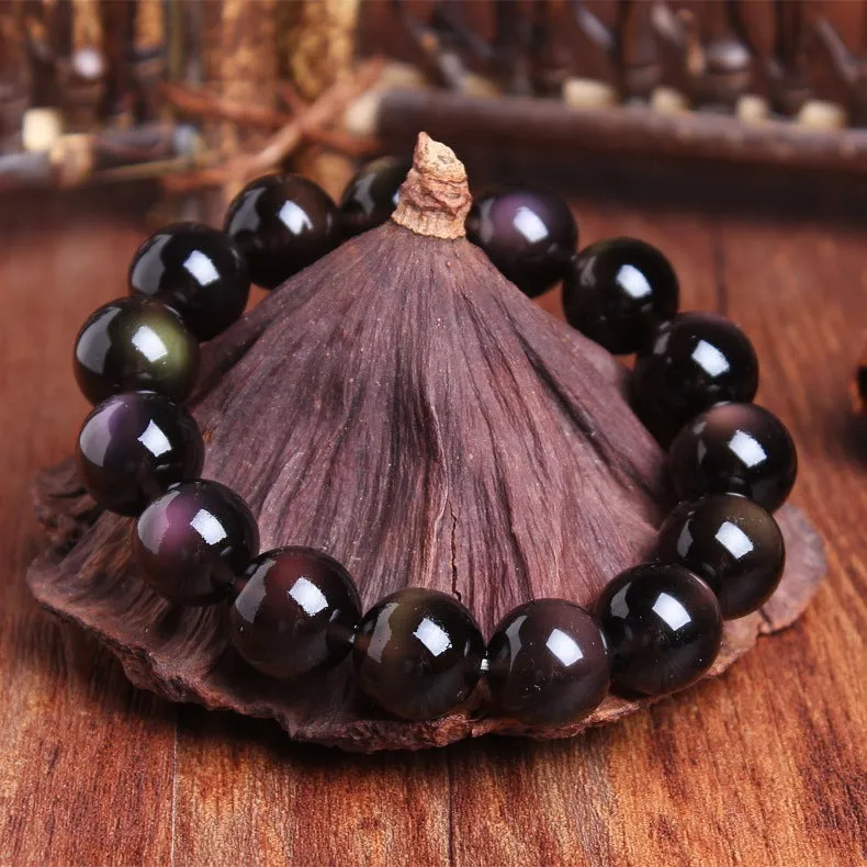 Polished crystal Pi Xiu bracelet with double-eye ice stone colouration in ethnic geometric style