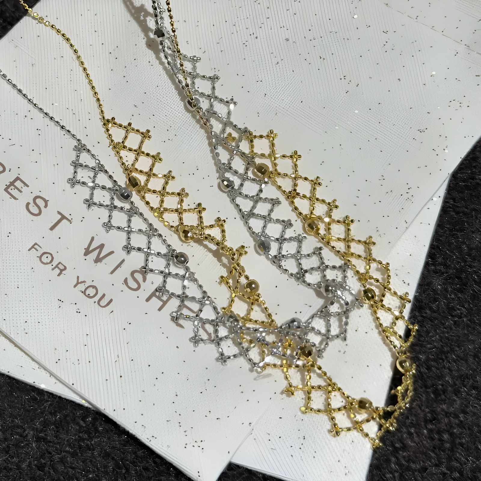 925 silver irregular geometric pendant necklace with electroplated finish on display