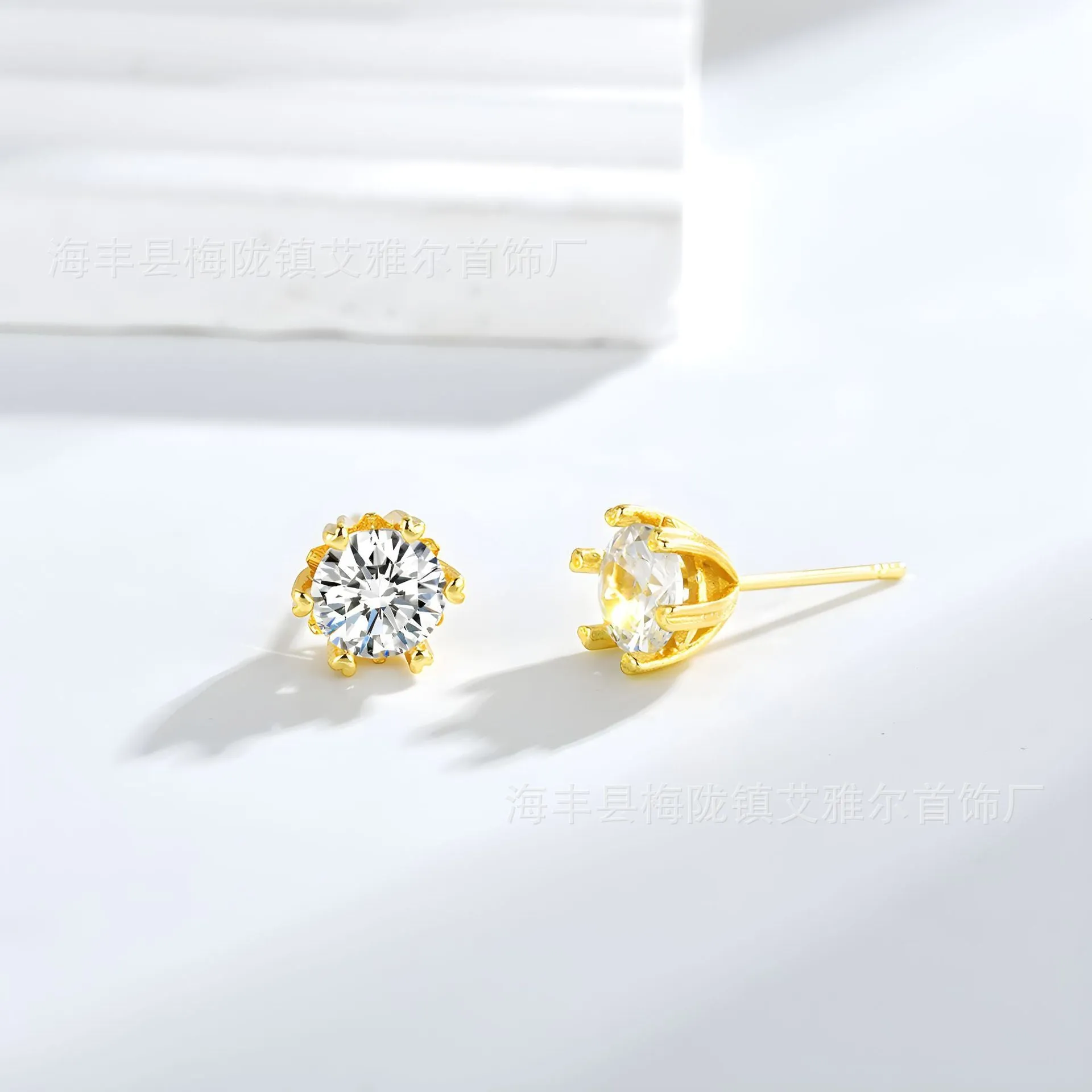 Silver brass zircon stud earrings heart shape hexagonal star design classic six-claw setting on white background
