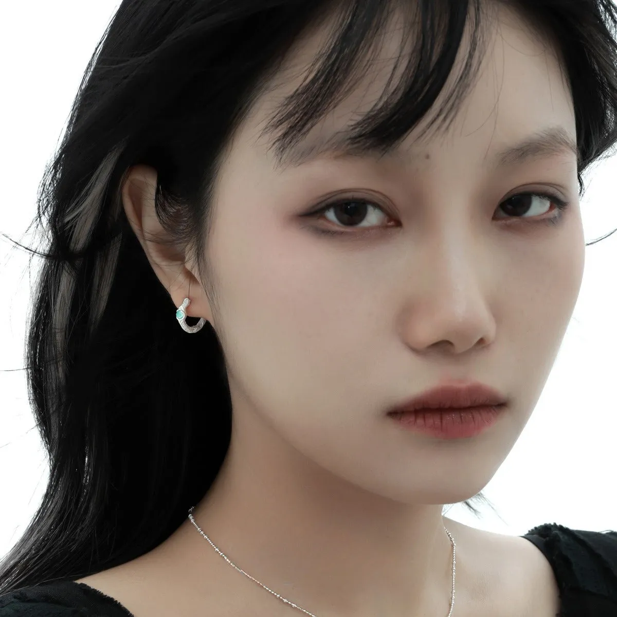 925 silver geometric round ear clip in burnt silver colour with clip-on mechanism, original design for women