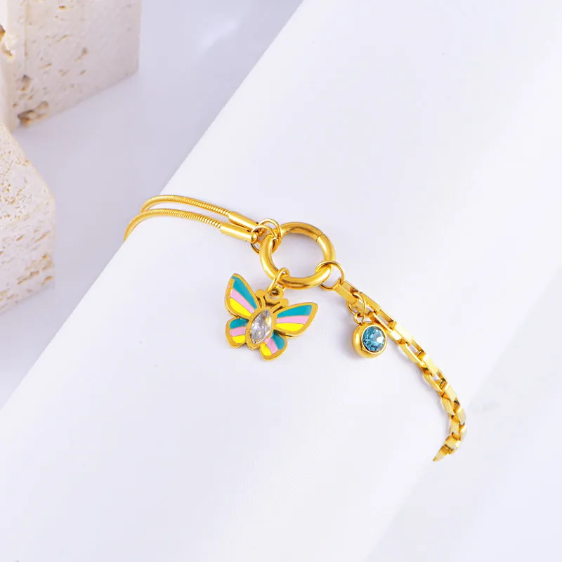 Gold-plated epoxy butterfly necklace and bracelet set with titanium steel construction and snake bone chain links