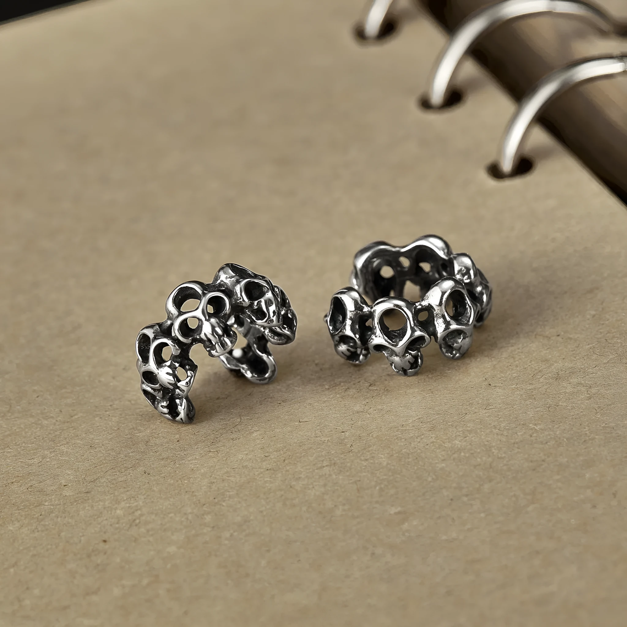 Stainless steel hollow skull ear clip earrings with geometric shape and retro design