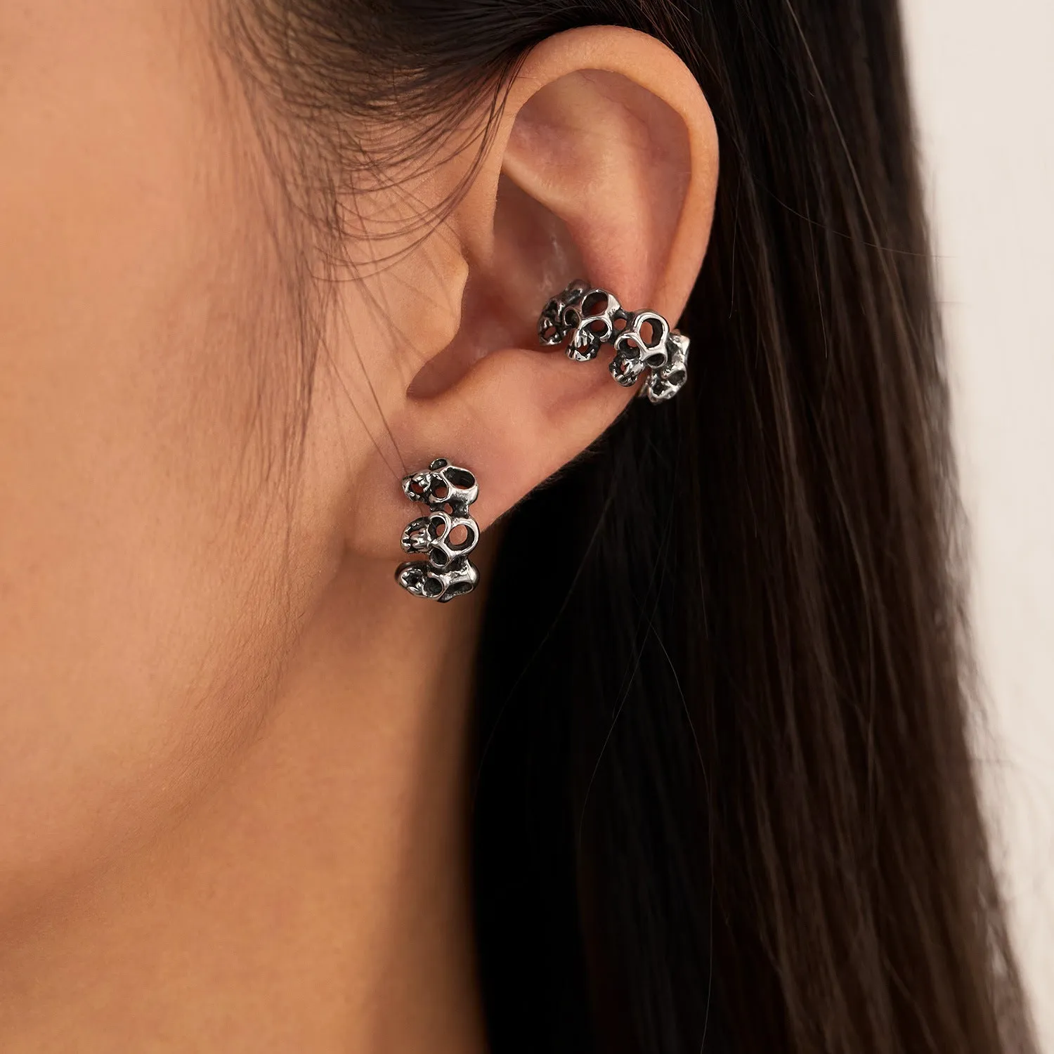 Stainless steel hollow skull ear clip earrings with geometric shape and retro design