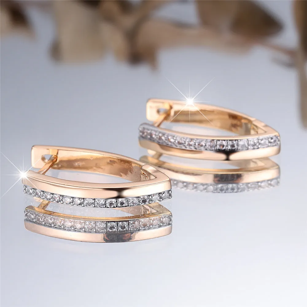 Women's V-shaped geometric ear clips, copper with electroplated champagne gold finish, clip-on style