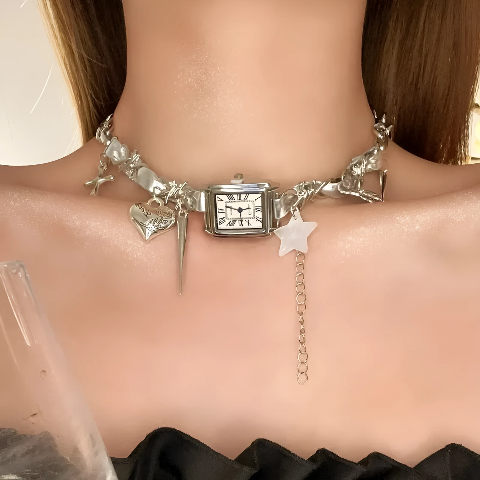 Dark multi-layer cross necklace with twin clavicle chains showing adjustable length and alloy construction