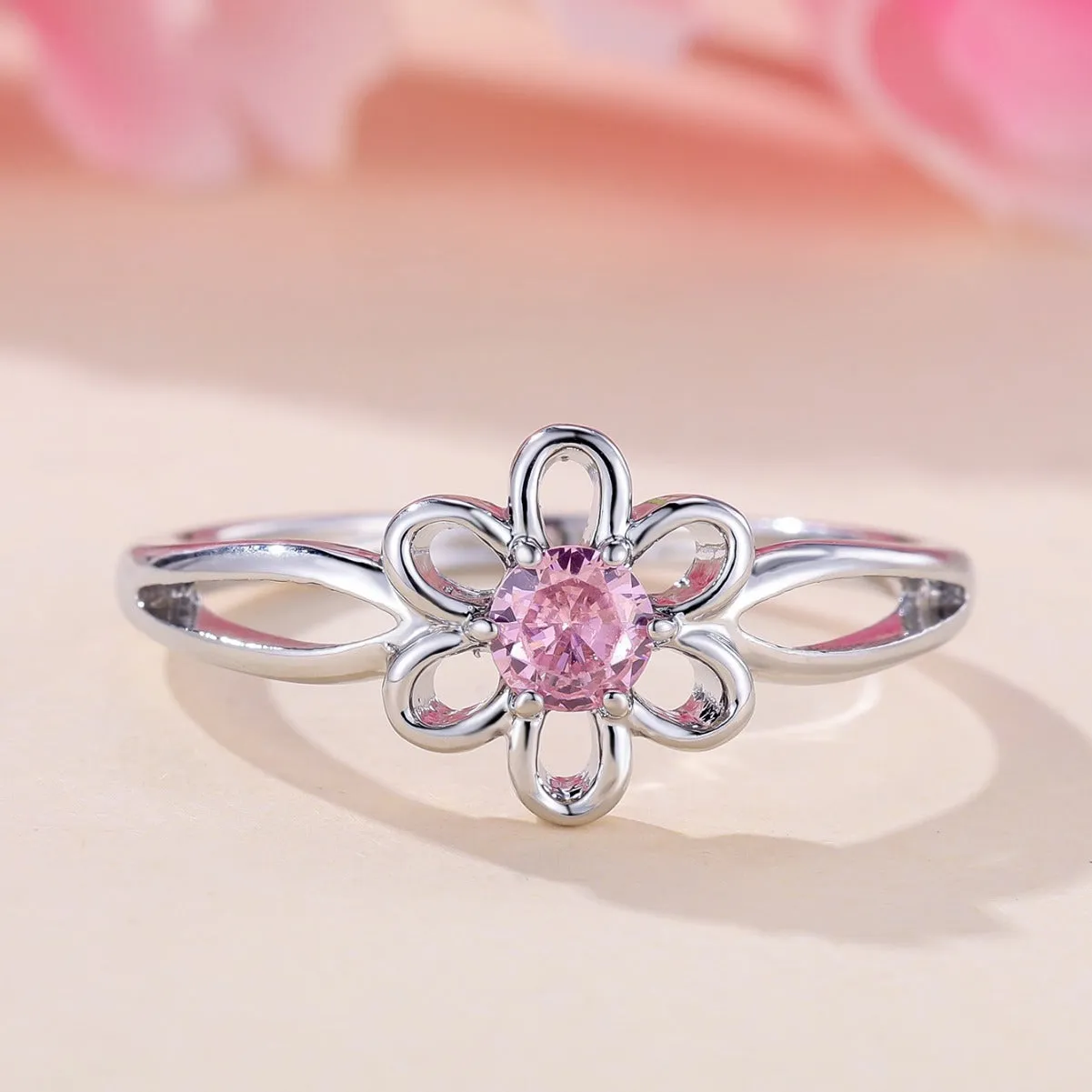 Lady's copper flower hollowed ring with electroplating finish in platinum pink diamond
