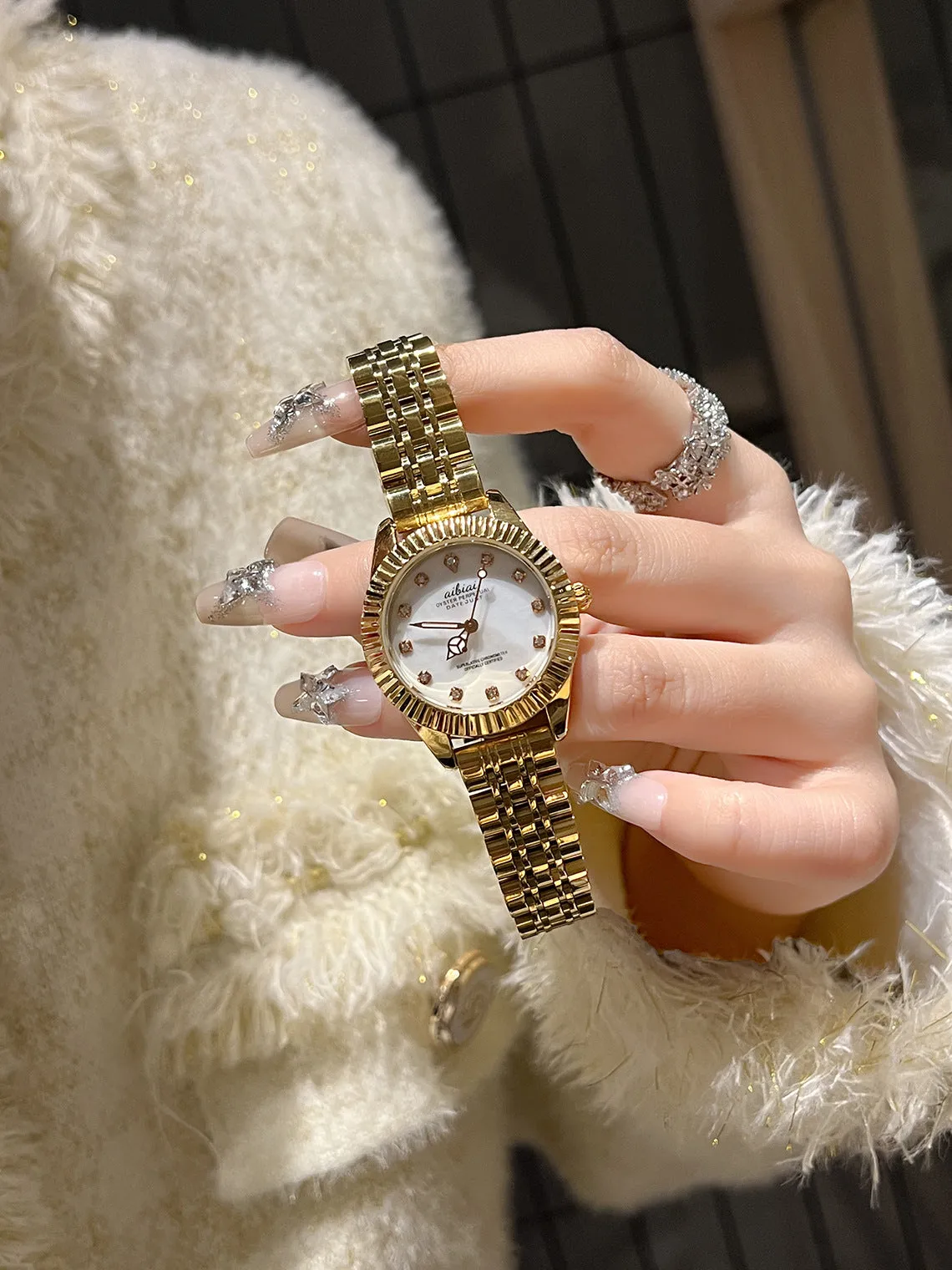 Steel watch for women with rose shell dial and black leather strap