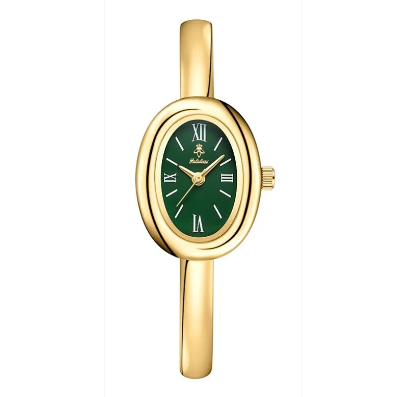 Women's oval retro quartz watch in gold spiral pattern on a white background