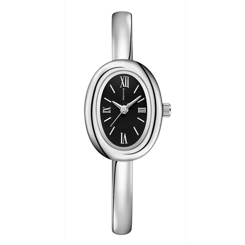 Women's oval retro quartz watch in gold spiral pattern on a white background