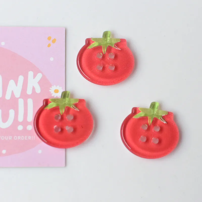 Set of medium-sized plastic or resin round tomato buttons with printed patterns in mixed or solid colours