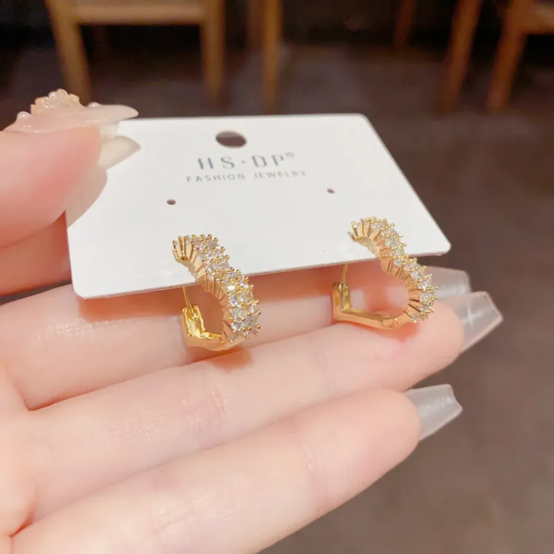 Heart shaped micro inlaid zircon ear clip with real gold plating on copper for women
