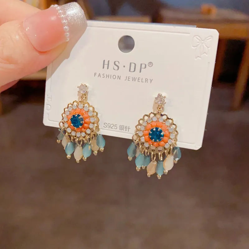 Diamond embedded round crystal tassel earrings in thick gold plated copper, geometric line style for women