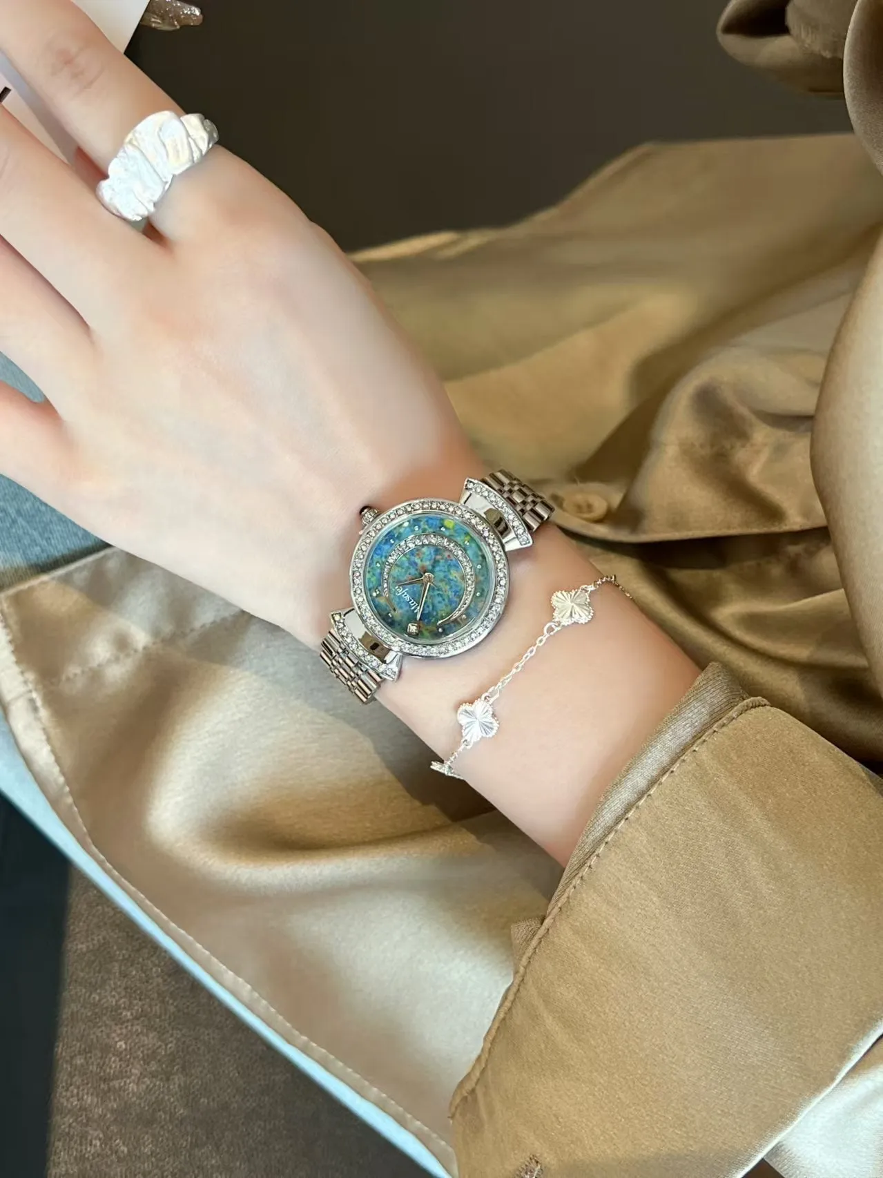 Starry Sky Fritillary Marble women's watch with 32mm dial, metal case, and steel strap