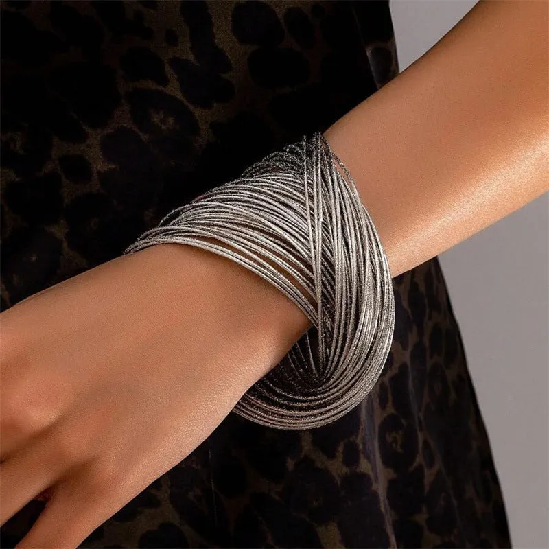 Irregular wide-brimmed zinc alloy bracelet with spring open design and electroplated finish in simple style