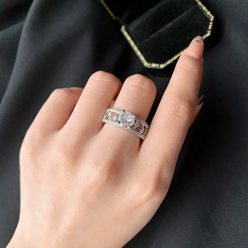 Women's copper hexagon hollow-out anti-moissanite ring in ins style on a plain background