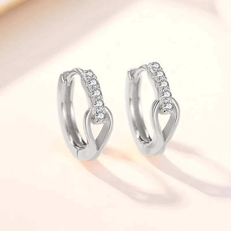 Copper geometric earrings with inlaid zircon in white gold colour on women