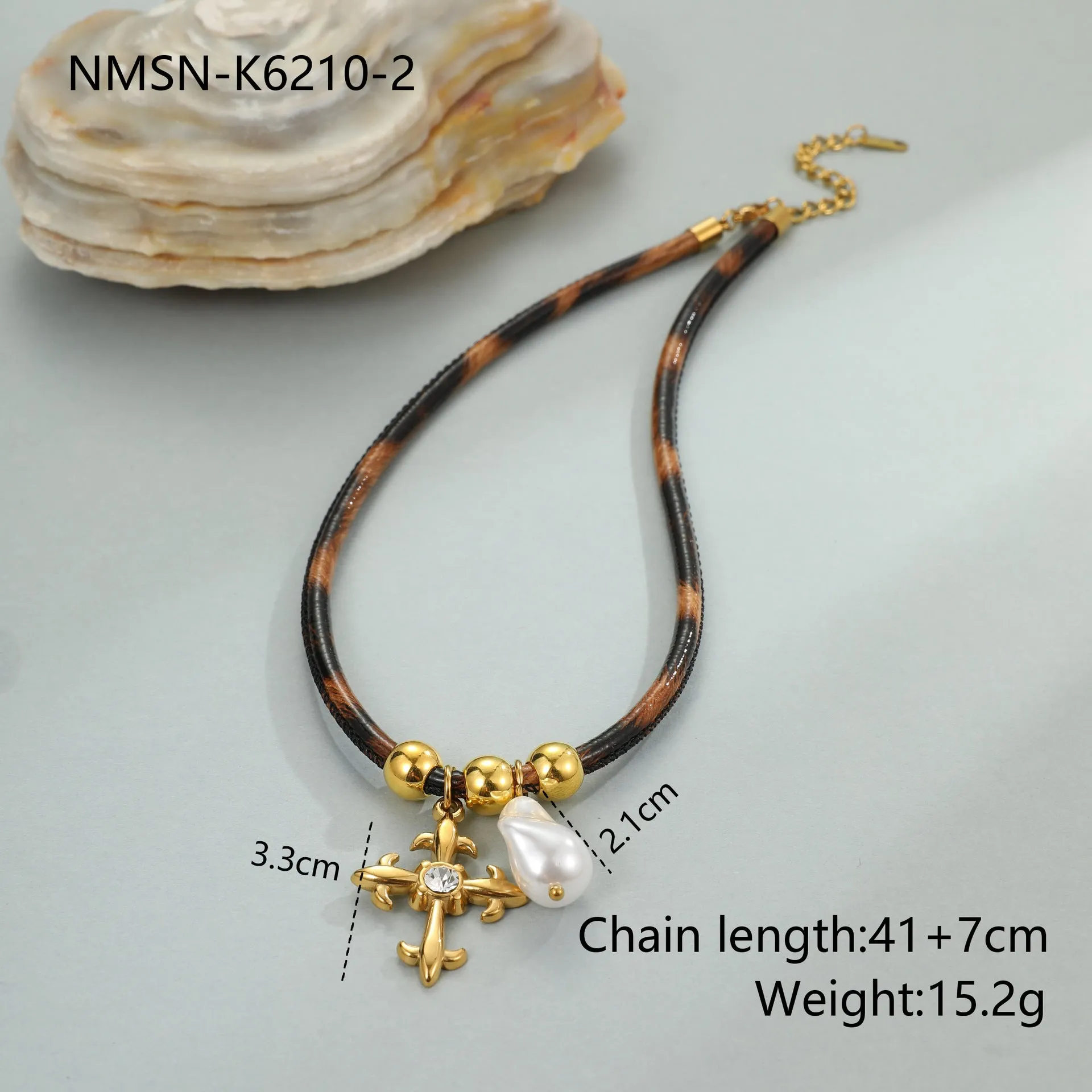 Geometric leopard head stainless steel necklace with gold electroplated finish on adjustable chain