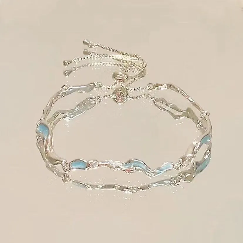 Fashion crystal zircon alloy bracelet for women in electroplated finish with blue wave design